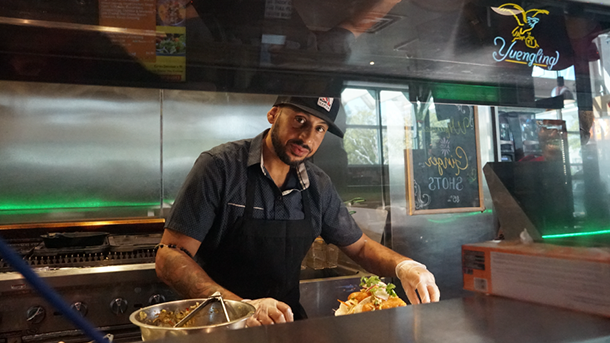 man cooking in a kitchen